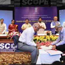 The Union Minister for Minority Affairs, Shri Mukhtar Abbas Naqvi witnessing the signing of MoUs, at the National Conference of Principal Secretaries-Secretaries in-charge of States - UTs dealing with Minority Affairs, in New Delhi on July 16, 2018.